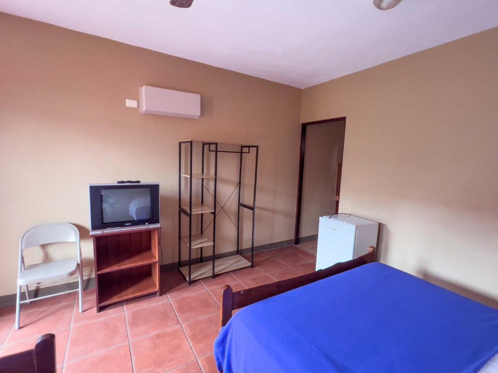 Postel nebo postele na pokoji v ubytování Belen Suites