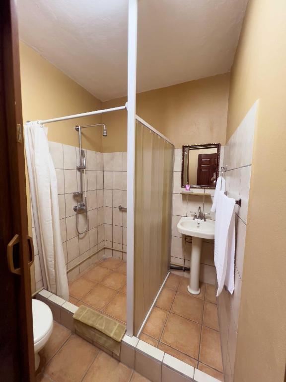 Koupelna v ubytování Belen Suites