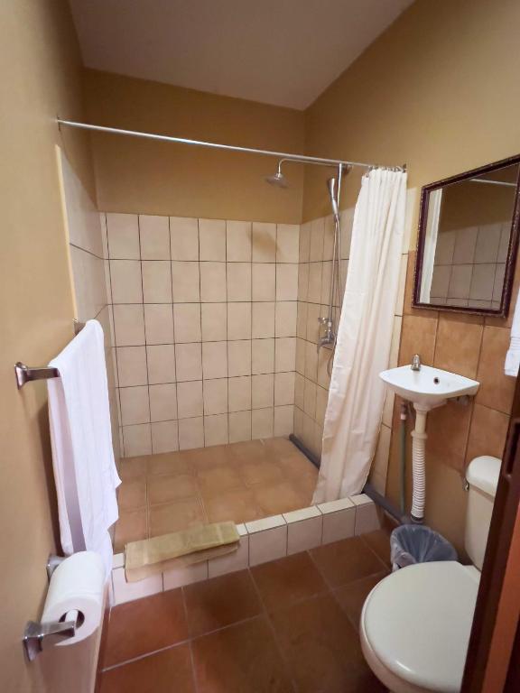 Koupelna v ubytování Belen Suites