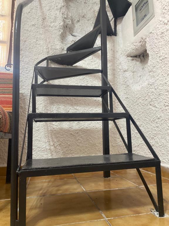 Palanda nebo palandy na pokoji v ubytování Terra Petra Mani