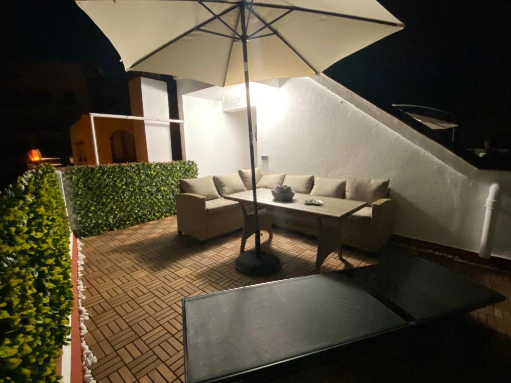 Posezení v ubytování Apartaments L’ARC