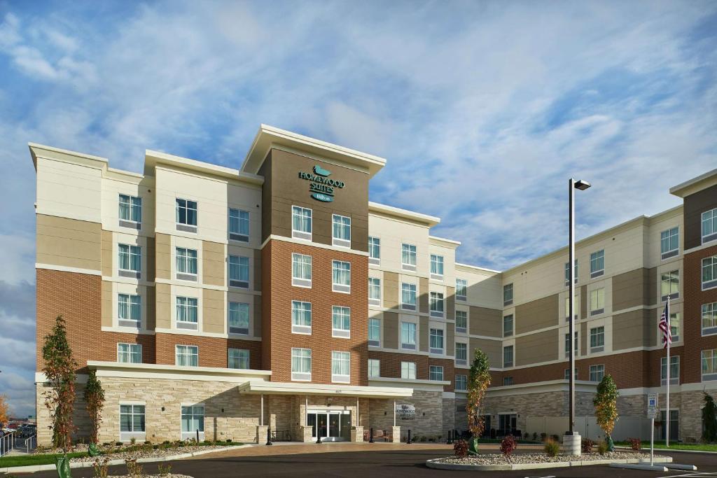 a rendering of the front of a hotel at Homewood Suites By Hilton Cincinnati Midtown in Cincinnati