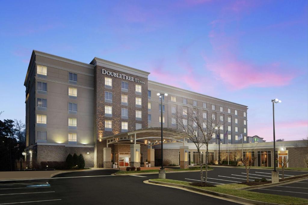 a rendering of a hotel with a parking lot at DoubleTree Richmond Airport in Sandston