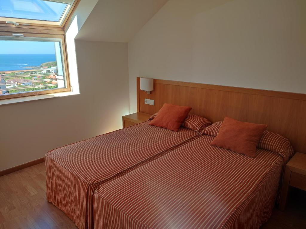 Postel nebo postele na pokoji v ubytování Apartamentos Marsil