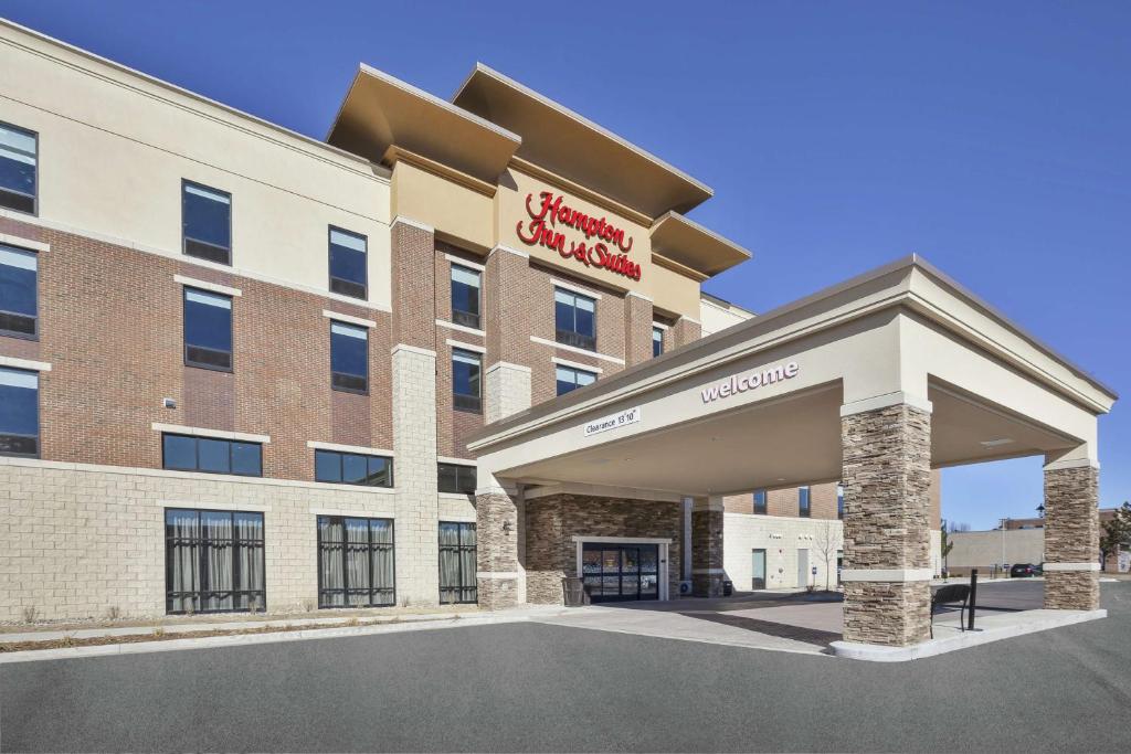 a rendering of the front of a hotel at Hampton Inn & Suites Grandville Grand Rapids South in Grandville