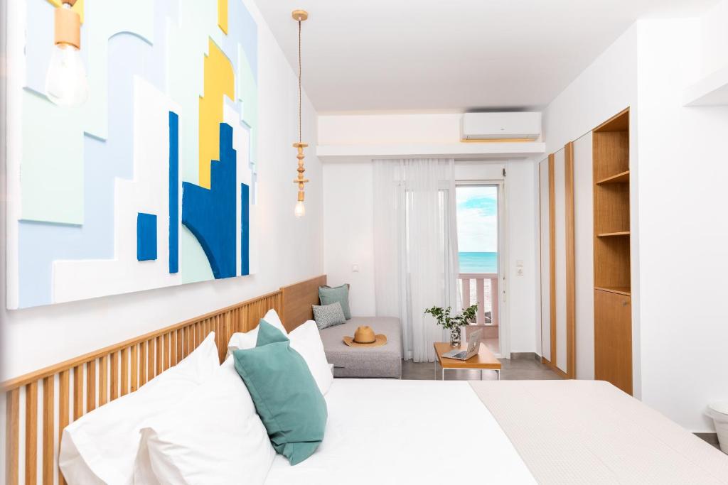 Postel nebo postele na pokoji v ubytování Hotel Samaras Beach