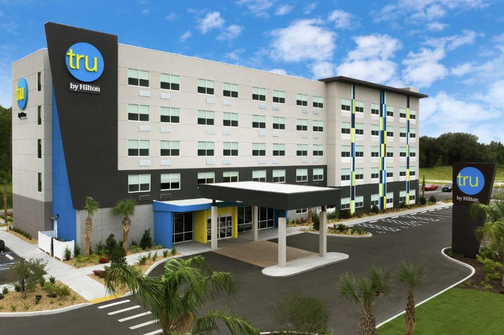 a rendering of a hotel with a building at Tru By Hilton Lake City in Lake City