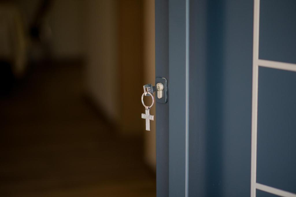 a door with a key in the middle at Apartment Domenica Medjugorje in Međugorje