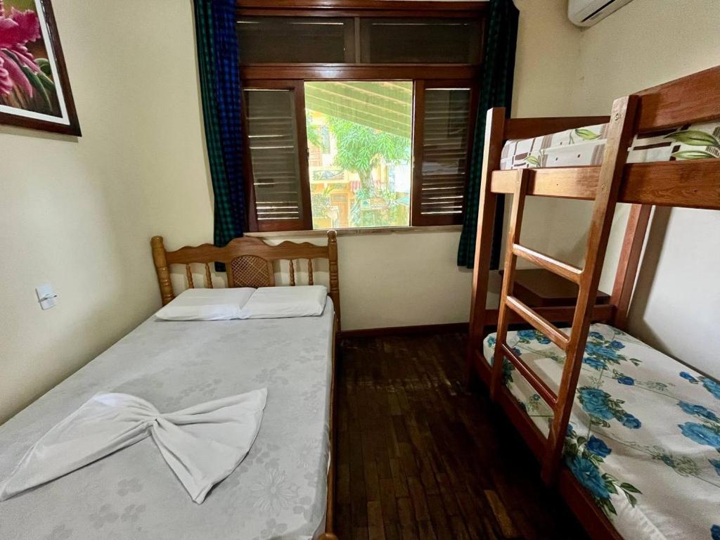 Postel nebo postele na pokoji v ubytování Hostel Manaus