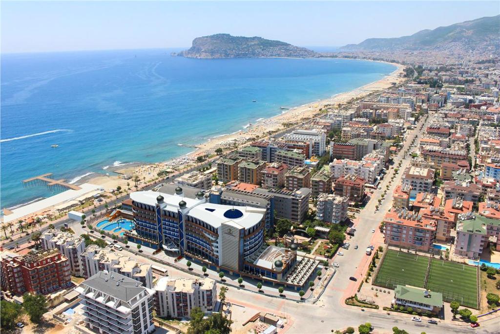 an aerial view of a city next to the ocean at Family 2bd Flat 150m to the Beach in Alanya