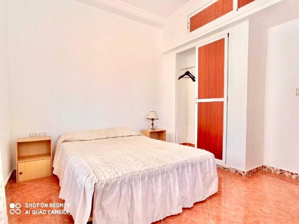 Postel nebo postele na pokoji v ubytování Blue holiday