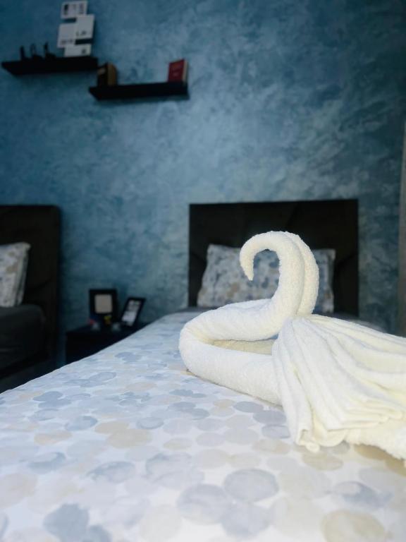 Postel nebo postele na pokoji v ubytování Appartement INES Saidia