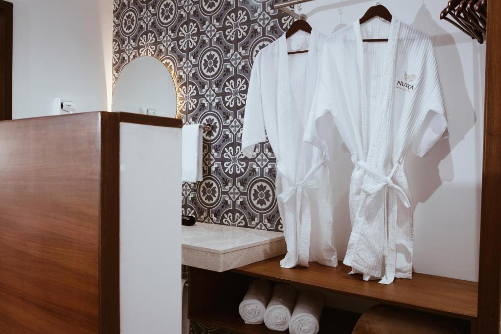 Koupelna v ubytování Nuxká Hotel