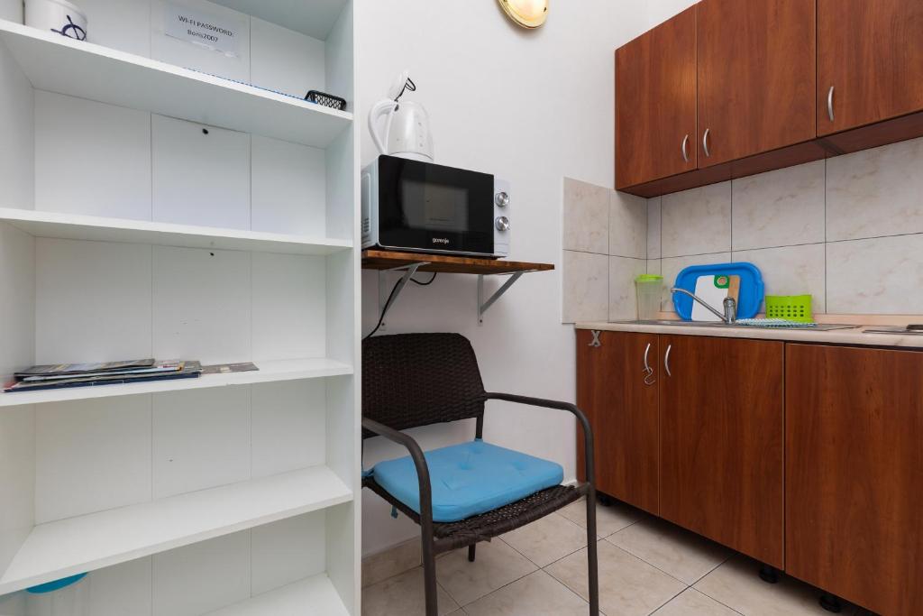 Kuchyň nebo kuchyňský kout v ubytování Apartments by the sea Duce, Omis - 13694