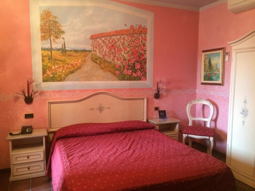 Postel nebo postele na pokoji v ubytování Hotel Bolero