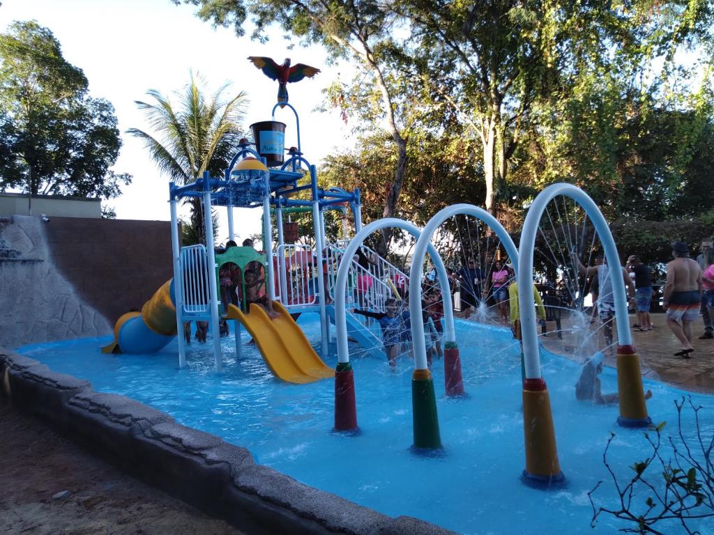 a water park with a bunch of water slides at C204 AP-Aldeia do Lago com cozinha , churrasqueira e bebidas liberadas no parque aquático, internet banda larga, ponto recarga de carro elétrico in Caldas Novas