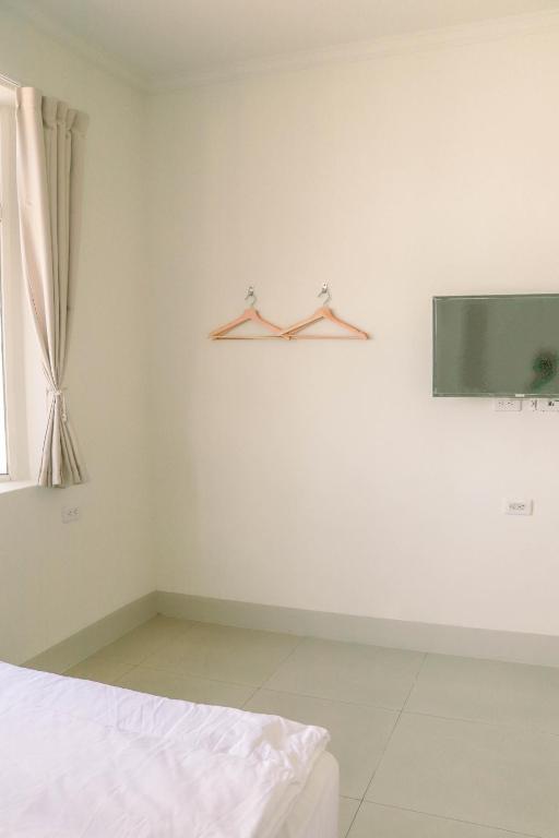 TV a/nebo společenská místnost v ubytování TETE Homestay