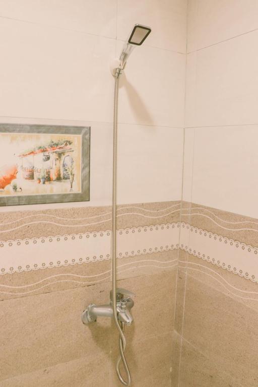 Koupelna v ubytování TETE Homestay