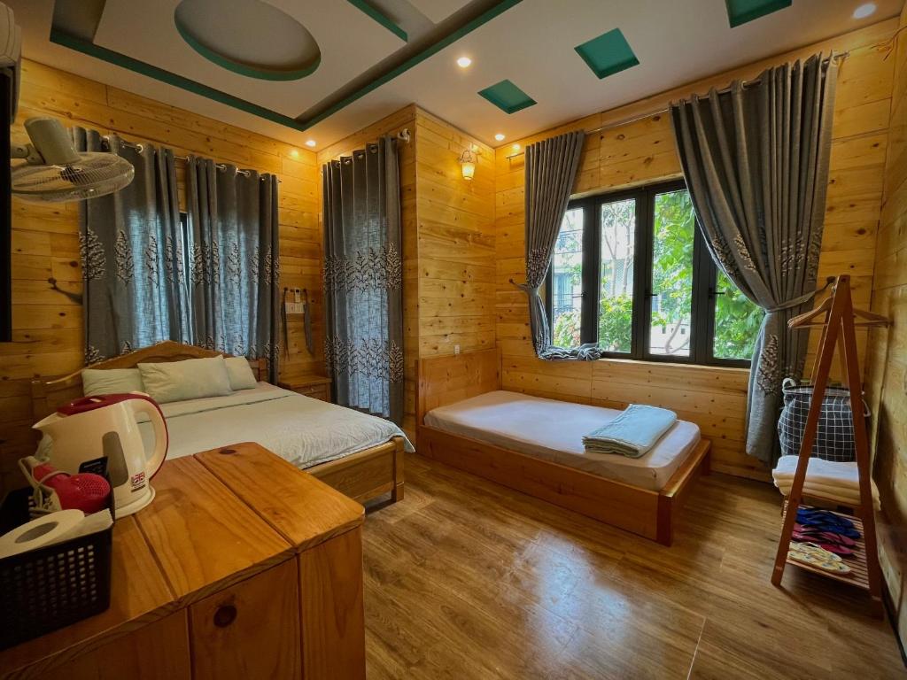 Voodi või voodid majutusasutuse Little Home Homestay toas