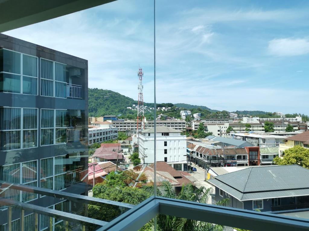 a view of a city from a building at 7 Floor - Ozone Condotel near Kata beach by 15 minutes walking in Kata Beach