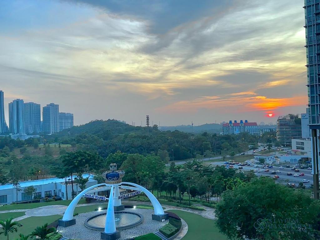 a view of a city with a roller coaster at Elysia Park Residence Medini by Stayrene in Nusajaya