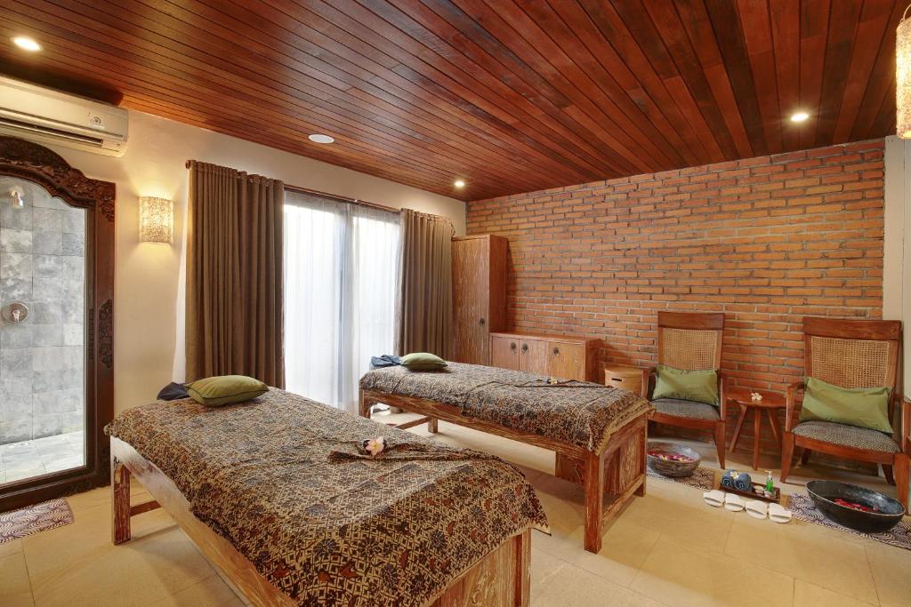 Postel nebo postele na pokoji v ubytování Lumbini Luxury Villas and Spa