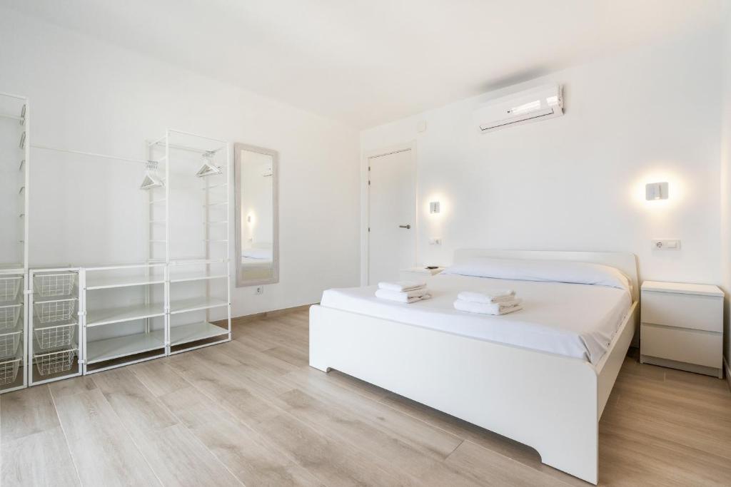 Posteľ alebo postele v izbe v ubytovaní WELCS APARTAMENTO 064 EMP frente al Mar