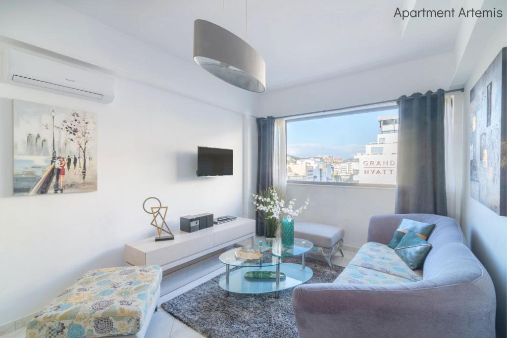 TV a/nebo společenská místnost v ubytování Apollo & Artemis by Heloni Apartments