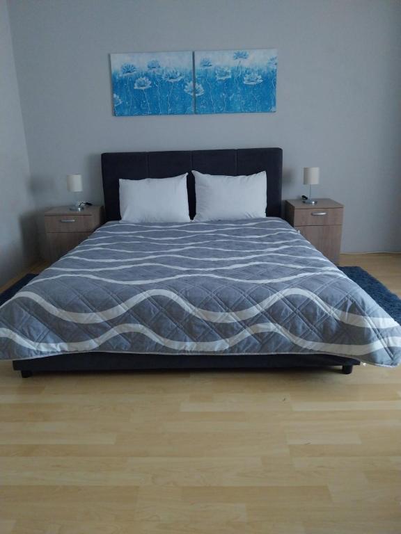 Postel nebo postele na pokoji v ubytování Apartments Tatjana