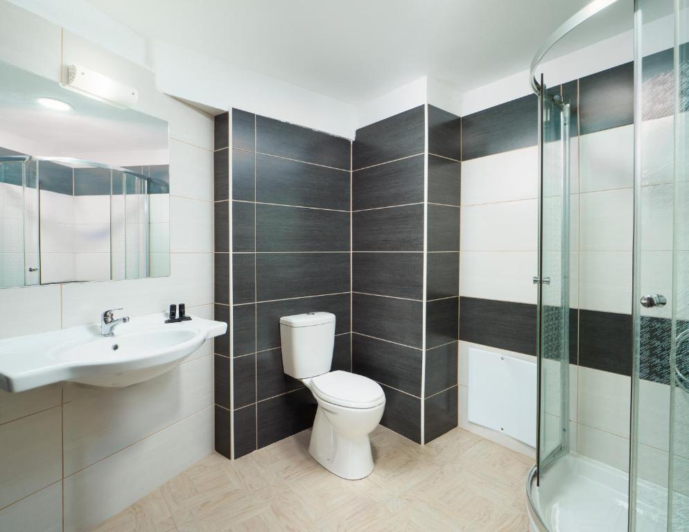 Koupelna v ubytování El Greco Hotel