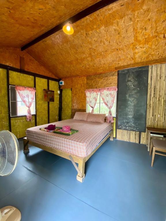 Letto o letti in una camera di Numpu Baandin