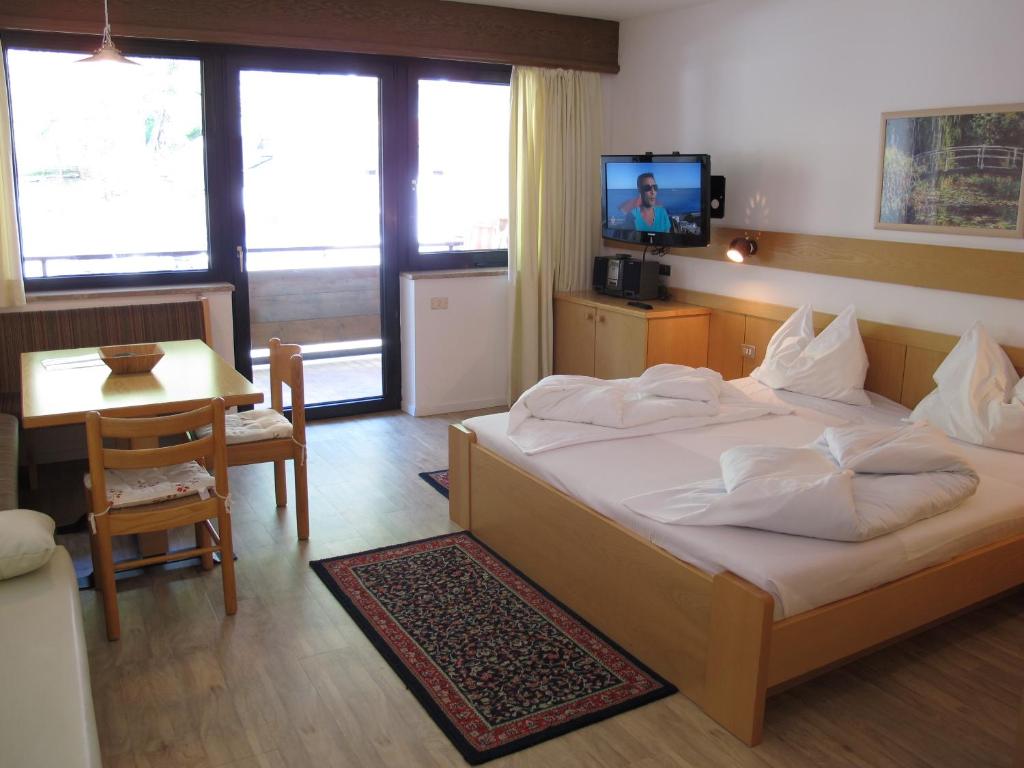 TV a/nebo společenská místnost v ubytování Alpina Mountain Resort