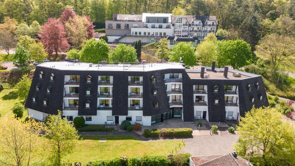 an aerial view of a large black building at Aparthotel Tannenhof in Wittlich