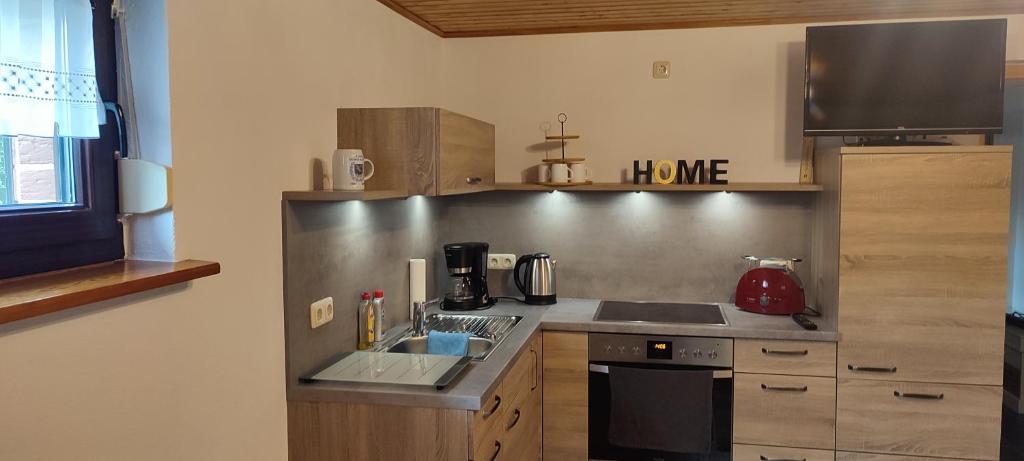 Kuchyň nebo kuchyňský kout v ubytování Apartments Achterblick
