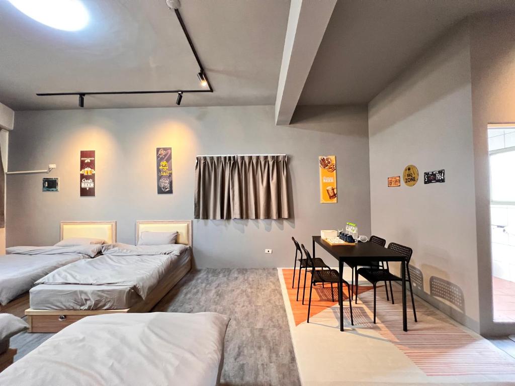 Postel nebo postele na pokoji v ubytování 鄉間旅人 自助入住