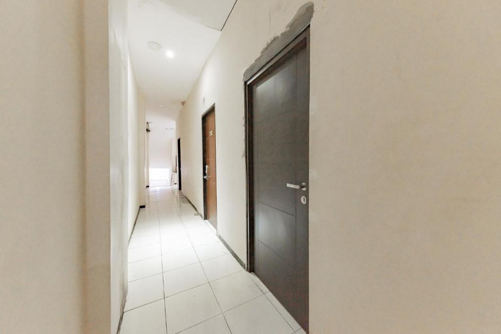 Fotografie z fotogalerie ubytování RedDoorz near Pasar Tarapung Siring Banjarmasin v destinaci Banjarmasin