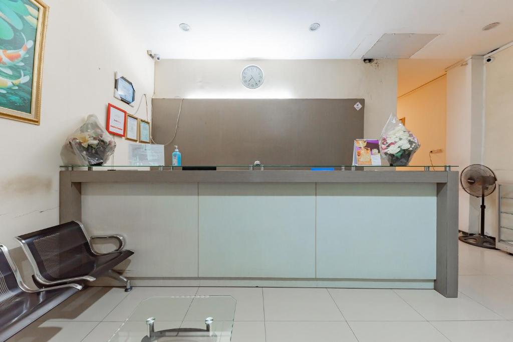 Fotografie z fotogalerie ubytování RedDoorz near Pasar Tarapung Siring Banjarmasin v destinaci Banjarmasin