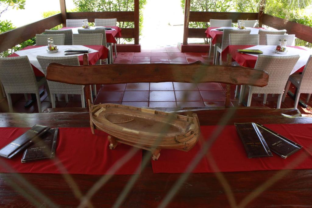 Reštaurácia alebo iné gastronomické zariadenie v ubytovaní Villa Kula