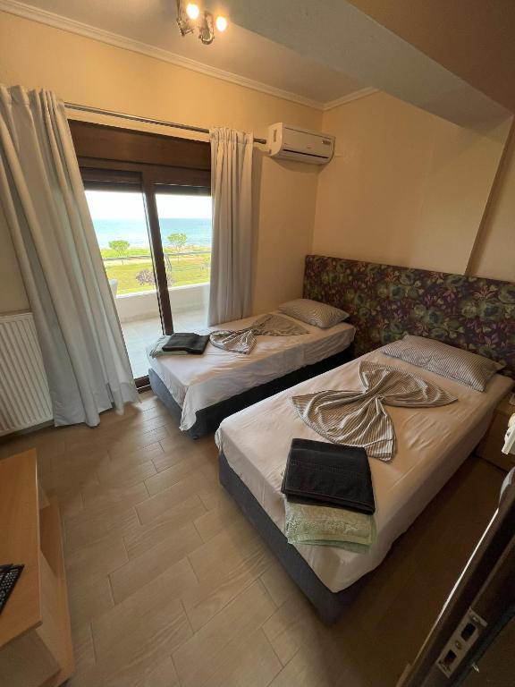 Postel nebo postele na pokoji v ubytování Tristan Beachfront House