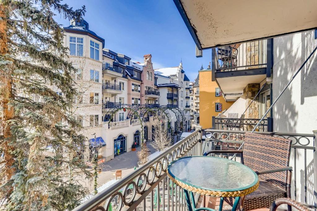 a balcony with a table and chairs at Lift House Lodge, Pet Friendly Studio Condo in Vail