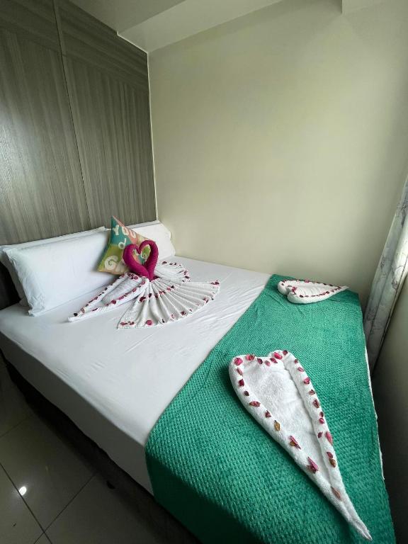 Green Residences Stays by PBYY - One-Bedroom Apartment