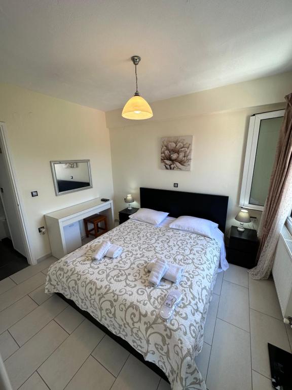 Postel nebo postele na pokoji v ubytování Olia apartment