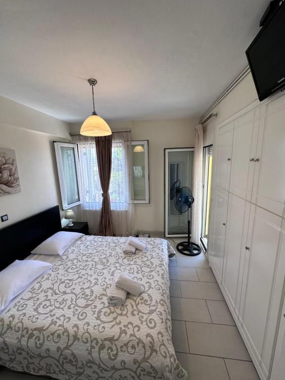 Postel nebo postele na pokoji v ubytování Olia apartment