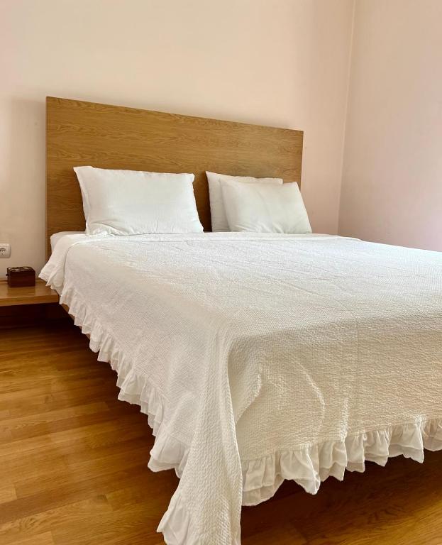 A bed or beds in a room at My Way Hotel