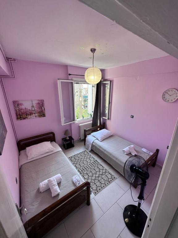 Postel nebo postele na pokoji v ubytování Olia apartment