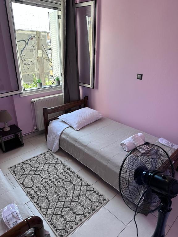 Postel nebo postele na pokoji v ubytování Olia apartment