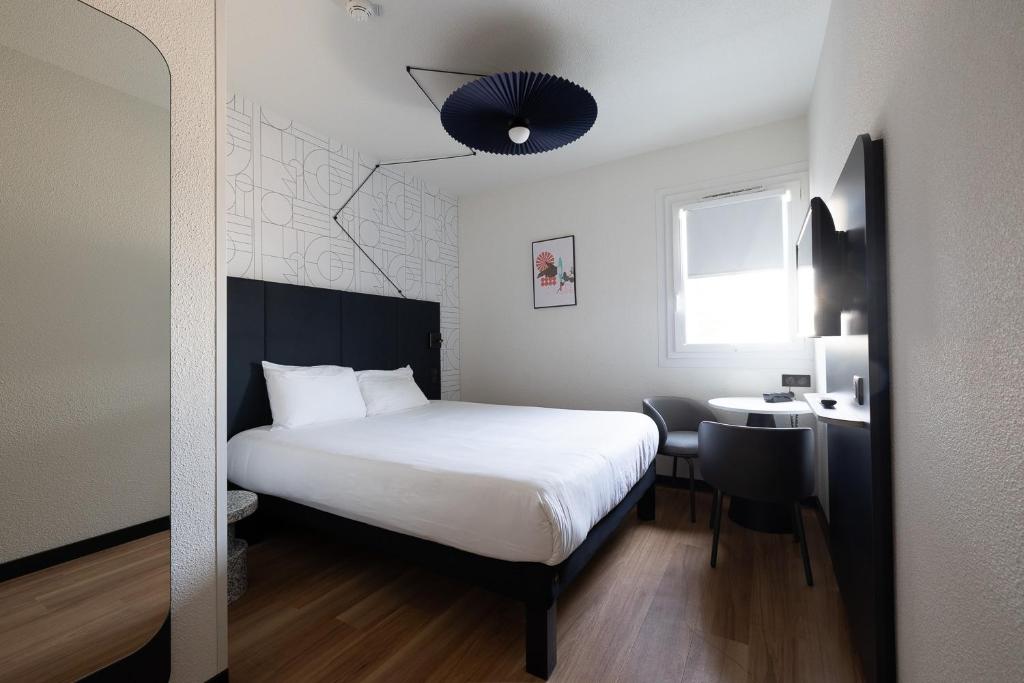 Postel nebo postele na pokoji v ubytování ibis Perpignan Sud Saint Charles