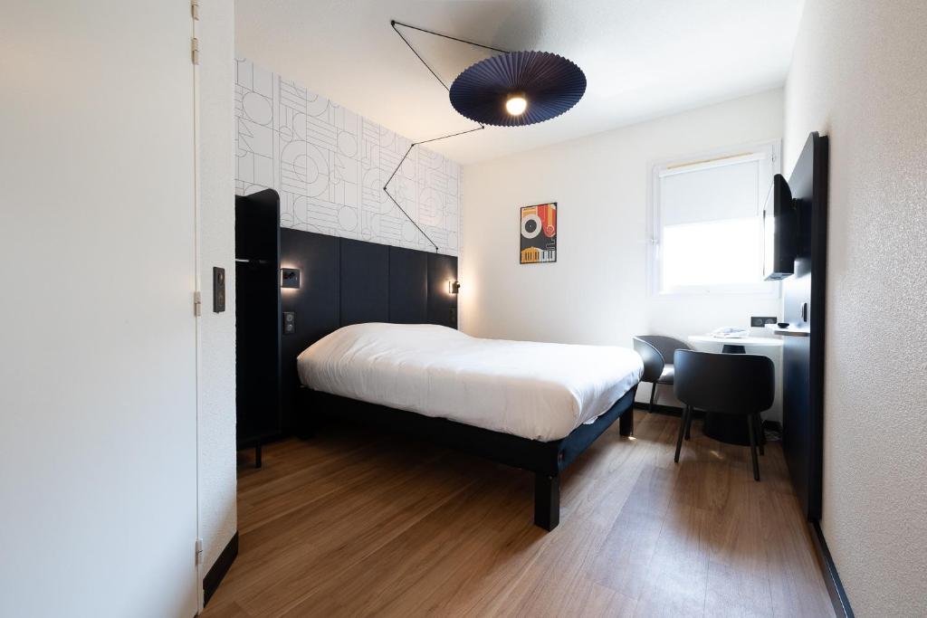 Postel nebo postele na pokoji v ubytování ibis Perpignan Sud Saint Charles