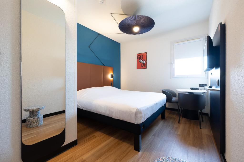 Postel nebo postele na pokoji v ubytování ibis Perpignan Sud Saint Charles