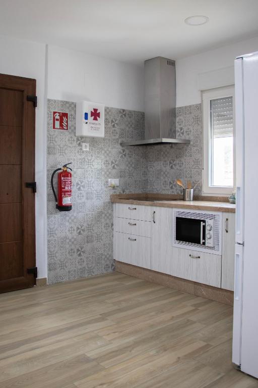 Kuchyňa alebo kuchynka v ubytovaní Casas rurales La Carrasca